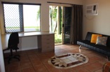Sliding doors provide direct access to the front garden and deck. The bathroom poses separate shower and bath options Sliding doors provide direct access to the front garden and deck. The bathroom poses separate shower and bath options